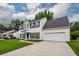 An attractive two-story home boasting a two-car garage and a well-maintained lawn at 3092 Morningdale Dr, Mount Pleasant, SC 29466