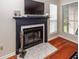 Living room fireplace with a black mantle and tiled hearth at 3092 Morningdale Dr, Mount Pleasant, SC 29466