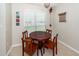 Eat-in kitchen with wood table and chairs, and a large window at 3092 Morningdale Dr, Mount Pleasant, SC 29466