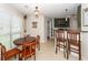 Eat-in kitchen with wood table and chairs, and breakfast bar seating at 3092 Morningdale Dr, Mount Pleasant, SC 29466