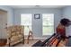 Comfortable living space with a telescope, vintage decor, and natural light, creating a unique atmosphere at 3092 Morningdale Dr, Mount Pleasant, SC 29466