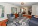 A well-lit living room features hardwood floors and plush seating at 3092 Morningdale Dr, Mount Pleasant, SC 29466
