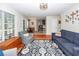 A spacious living room features hardwood floors and plush seating at 3092 Morningdale Dr, Mount Pleasant, SC 29466