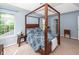 Spacious main bedroom with a four-poster bed and ample natural light at 3092 Morningdale Dr, Mount Pleasant, SC 29466