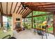 Relaxing sunroom featuring fireplace, television, and view of backyard at 3092 Morningdale Dr, Mount Pleasant, SC 29466