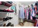 A spacious walk-in closet with ample storage, hanging racks, and shelving for shoes and accessories at 3203 Moonlight Dr, Charleston, SC 29414
