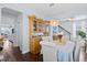 Elegant dining room with hardwood floors, a stylish hutch, and a charming chandelier at 3203 Moonlight Dr, Charleston, SC 29414