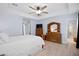 Well-appointed main bedroom with wooden furniture and ensuite bath at 3203 Moonlight Dr, Charleston, SC 29414