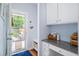 Mud room with convenient access to the outdoors and built in bench at 3203 Moonlight Dr, Charleston, SC 29414