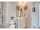 Bathroom featuring a toilet, vanity with sink and decorative wall art with decorative hand towels at 3278 Great Egret Dr, Johns Island, SC 29455
