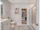 Bright bathroom featuring a toilet, a full walk-in closet, and shower at 3278 Great Egret Dr, Johns Island, SC 29455