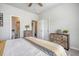 Bedroom featuring a bed with a patterned comforter, dresser, and access to a bathroom and closet at 3278 Great Egret Dr, Johns Island, SC 29455