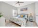 Bright bedroom with seaside decorations, natural light, and hardwood floors at 3278 Great Egret Dr, Johns Island, SC 29455