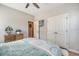 Comfortable bedroom features natural light, ceiling fan, and hardwood floors at 3278 Great Egret Dr, Johns Island, SC 29455