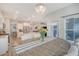 Open dining area offers a wood table with views to the kitchen and other living areas at 3278 Great Egret Dr, Johns Island, SC 29455