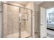 Tiled walk-in shower with glass door and chrome fixtures at 3278 Great Egret Dr, Johns Island, SC 29455