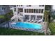 Aerial view showcasing a stunning pool, outdoor kitchen, and expansive backyard designed for entertainment and relaxation at 3307 Waterway Blvd, Isle of Palms, SC 29451