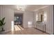 Elegant foyer featuring a stylish console table, decorative mirror, and views to the living room at 3307 Waterway Blvd, Isle of Palms, SC 29451