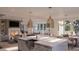 Beautiful open-concept kitchen with stylish island, modern appliances, and a cozy living area at 3307 Waterway Blvd, Isle of Palms, SC 29451