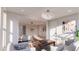 View from the living room into the bedroom, which are connected by a wide cased opening at 3307 Waterway Blvd, Isle of Palms, SC 29451