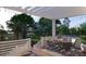 The covered patio features a pergola and offers a relaxing outdoor space at 3307 Waterway Blvd, Isle of Palms, SC 29451