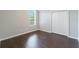 Bedroom featuring hardwood floors, closet, and window allowing natural light at 332 Clayton Dr, Charleston, SC 29414