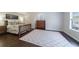 Spacious main bedroom with hardwood floors, a king-sized bed, and dresser at 332 Clayton Dr, Charleston, SC 29414