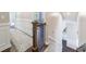 Staircase with white trim, dark wood floors, and a decorative runner at 332 Clayton Dr, Charleston, SC 29414