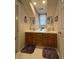 Bathroom featuring a long dual sink vanity with ample cabinet space at 351 Duncan Chapel Rd, Harleyville, SC 29448