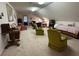 Expansive bonus room with multiple seating areas, offering versatility and comfort at 351 Duncan Chapel Rd, Harleyville, SC 29448