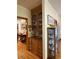 Hallway featuring wood cabinets with decorative display shelves at 351 Duncan Chapel Rd, Harleyville, SC 29448
