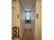 Bright hallway niche with a window seat and sheer curtains for a charming touch at 351 Duncan Chapel Rd, Harleyville, SC 29448