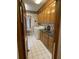 Spacious laundry room with washer, dryer, counter space, and sink at 351 Duncan Chapel Rd, Harleyville, SC 29448