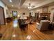 Large living room with hardwood floors, a fireplace, and ample seating at 351 Duncan Chapel Rd, Harleyville, SC 29448
