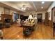 Bright and open living room with hardwood floors, fireplace, and comfortable seating at 351 Duncan Chapel Rd, Harleyville, SC 29448