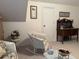 Cozy sitting area features wicker seating and vintage furniture at 351 Duncan Chapel Rd, Harleyville, SC 29448