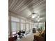 Bright sunroom featuring neutral décor, ceiling fans, and windows allowing natural light to flood the space at 351 Duncan Chapel Rd, Harleyville, SC 29448