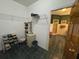 Large walk-in closet featuring wire shelving for storage and door to the main bathroom at 351 Duncan Chapel Rd, Harleyville, SC 29448