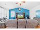 Relaxing living area is furnished with comfortable seating and an entertainment center at 405 Watershed Dr Dr, Goose Creek, SC 29445