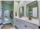 Bathroom with double vanity, mirrors, and modern fixtures at 444 Cedarview Rd, Summerville, SC 29486