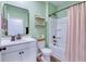 Bathroom featuring a shower-tub combination, vanity, and a decorative mirror at 444 Cedarview Rd, Summerville, SC 29486