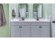 Bright bathroom featuring a double vanity, modern mirrors, and fixtures for convenience at 444 Cedarview Rd, Summerville, SC 29486