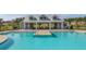 Resort-style pool featuring covered picnic areas with picnic tables perfect for gatherings and summer fun at 444 Cedarview Rd, Summerville, SC 29486