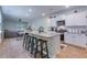 Modern kitchen with white cabinets, granite countertops, stainless steel appliances, and a center island with seating at 444 Cedarview Rd, Summerville, SC 29486