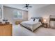 Comfortable main bedroom features a large window, cozy carpet and decorative accents for relaxation at 444 Cedarview Rd, Summerville, SC 29486