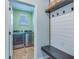 Functional mudroom with laundry area, built-in bench, and plenty of storage space at 444 Cedarview Rd, Summerville, SC 29486