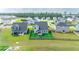 Aerial view of a fenced backyard featuring a swing set and lush green lawn at 447 Navona Dr, Summerville, SC 29486