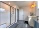 Bathroom features a large glass shower with white tile and a modern vanity with storage space at 447 Navona Dr, Summerville, SC 29486