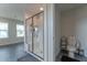 Bathroom features a glass shower with a built-in seat, and a separate toilet with a storage rack at 447 Navona Dr, Summerville, SC 29486