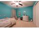 Cozy bedroom features gray walls, a ceiling fan, and a comfortable bed at 447 Navona Dr, Summerville, SC 29486